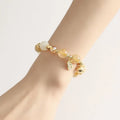 Gold electroplated rutilated quartz crystal bracelet with Korean minimalist design