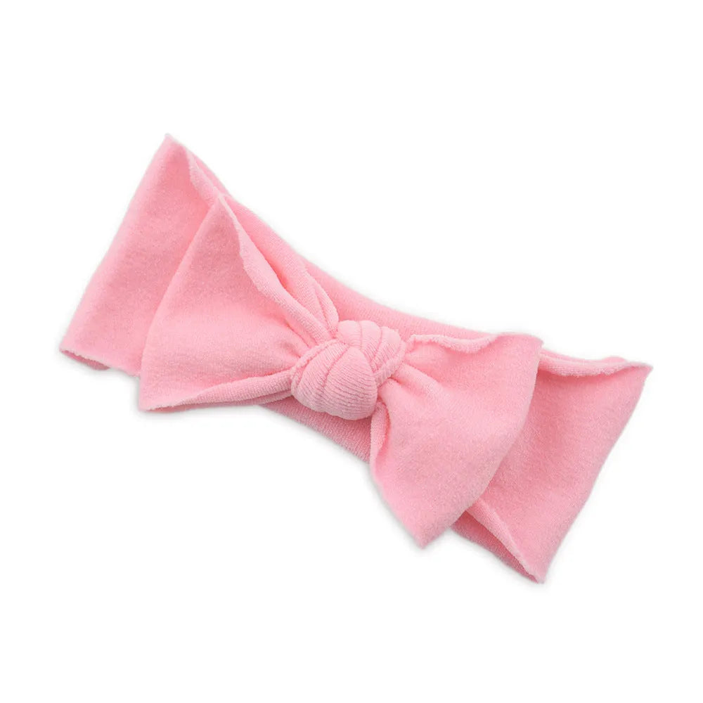 Solid colour knotted cloth headband for baby girls with bowknot design, available in 37 colours