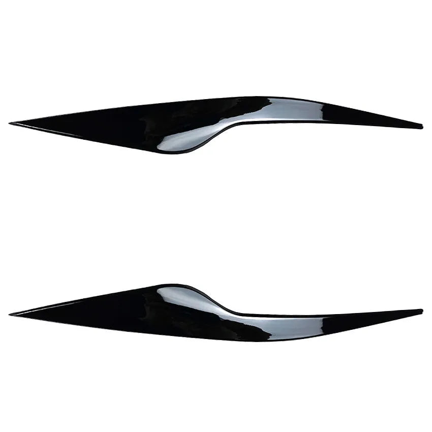 Ford Focus front headlight with carbon fiber pattern ABS eyebrow decal applied for external decorative modification
