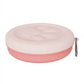 Portable outdoor dog bowl set in light green and pink, showing food bowl, water dish, and snack box compartment.