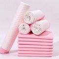 Pack of pet urinal pads showing different sizes and models including bamboo charcoal variant