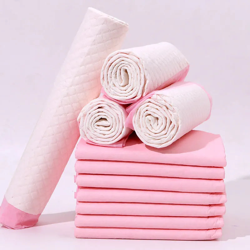 Pack of pet urinal pads showing different sizes and models including bamboo charcoal variant