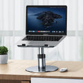 Silver adjustable aluminium laptop stand shown at various heights with rotating base.