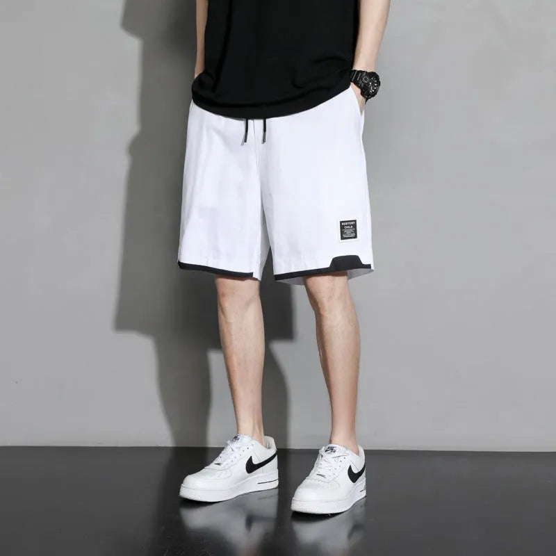 Boys cotton shorts in black, khaki, or white, shown in a loose-fitting Japanese style for summer.