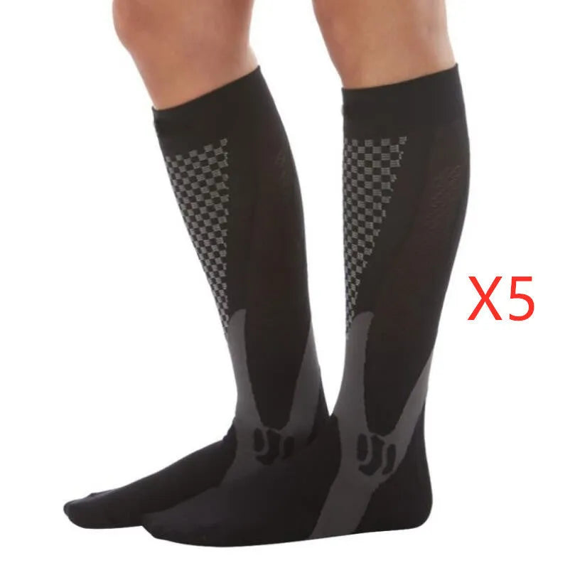 Graduated compression socks in black, shown with size guide for S/M, L/XL, and XXL.