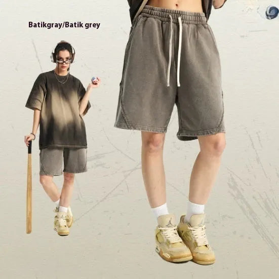 Men's batik washed cotton terry shorts in loose fit, shown in Batik Black colour