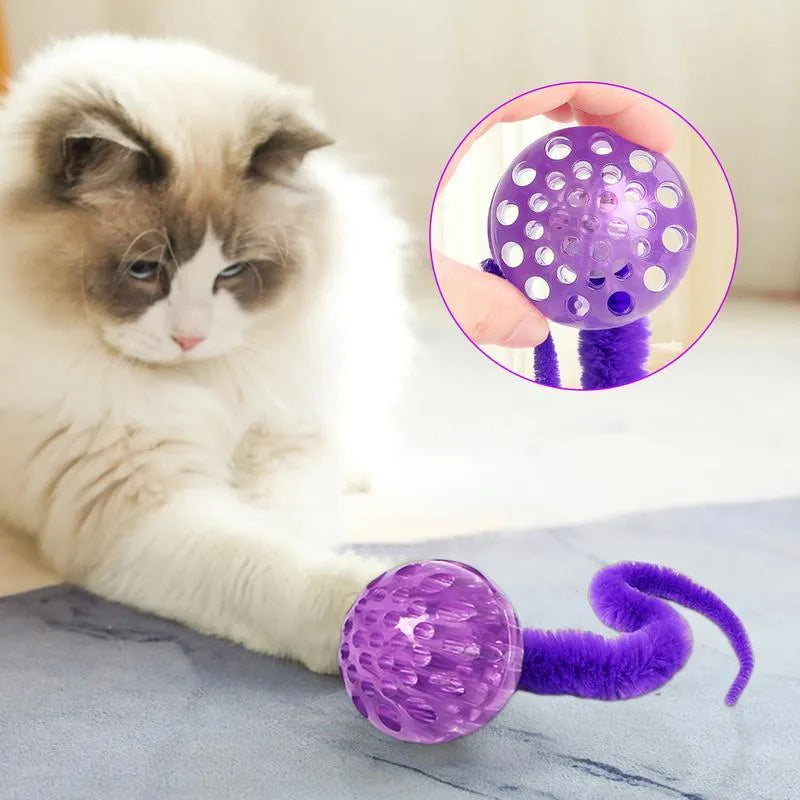 Interactive cat ball toy with worm tail attachment in green, pink, or purple colours