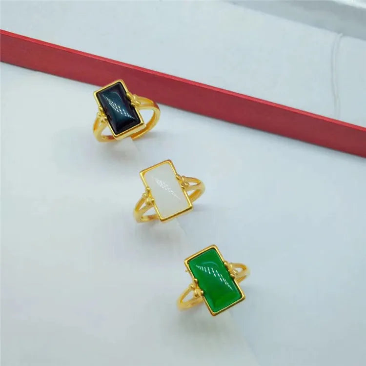 Adjustable brass gold-plated ring with black gemstone inlay and electroplated finish
