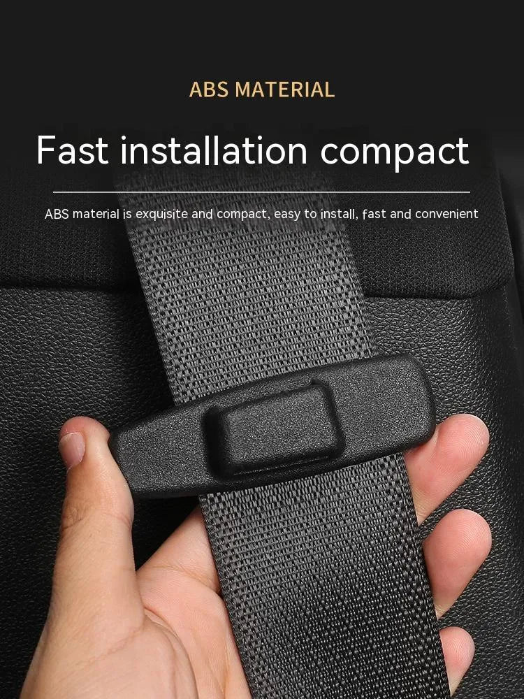 Two black ABS plastic universal car seatbelt stopper clips in clear OPP packaging
