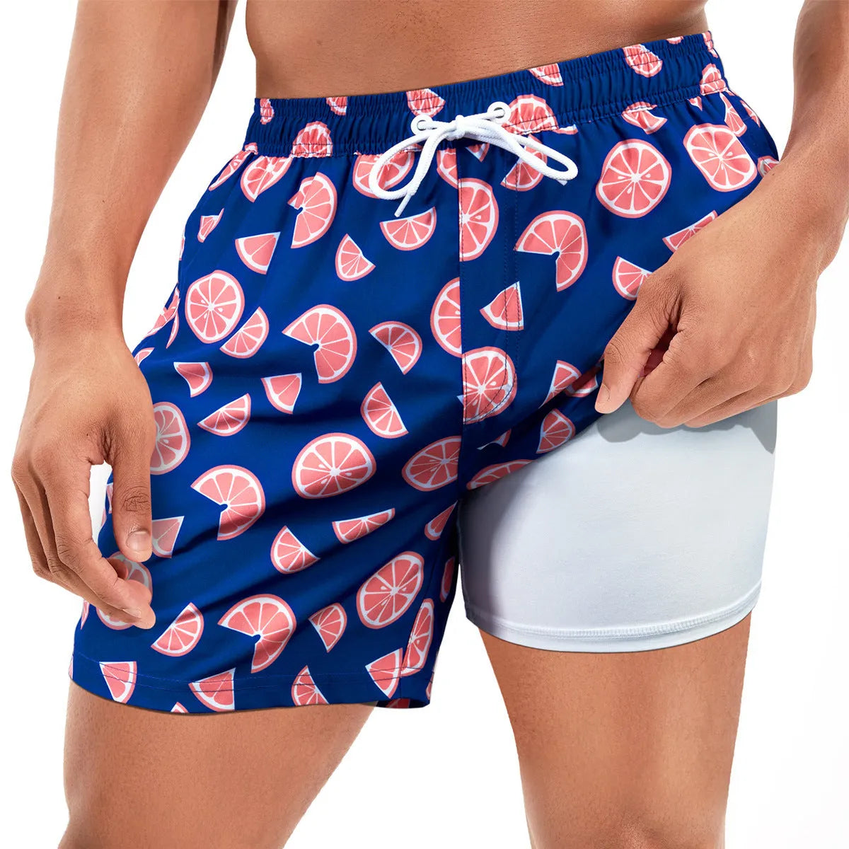 Men's loose fit quick-drying swimming trunks in various floral patterns and solid colours