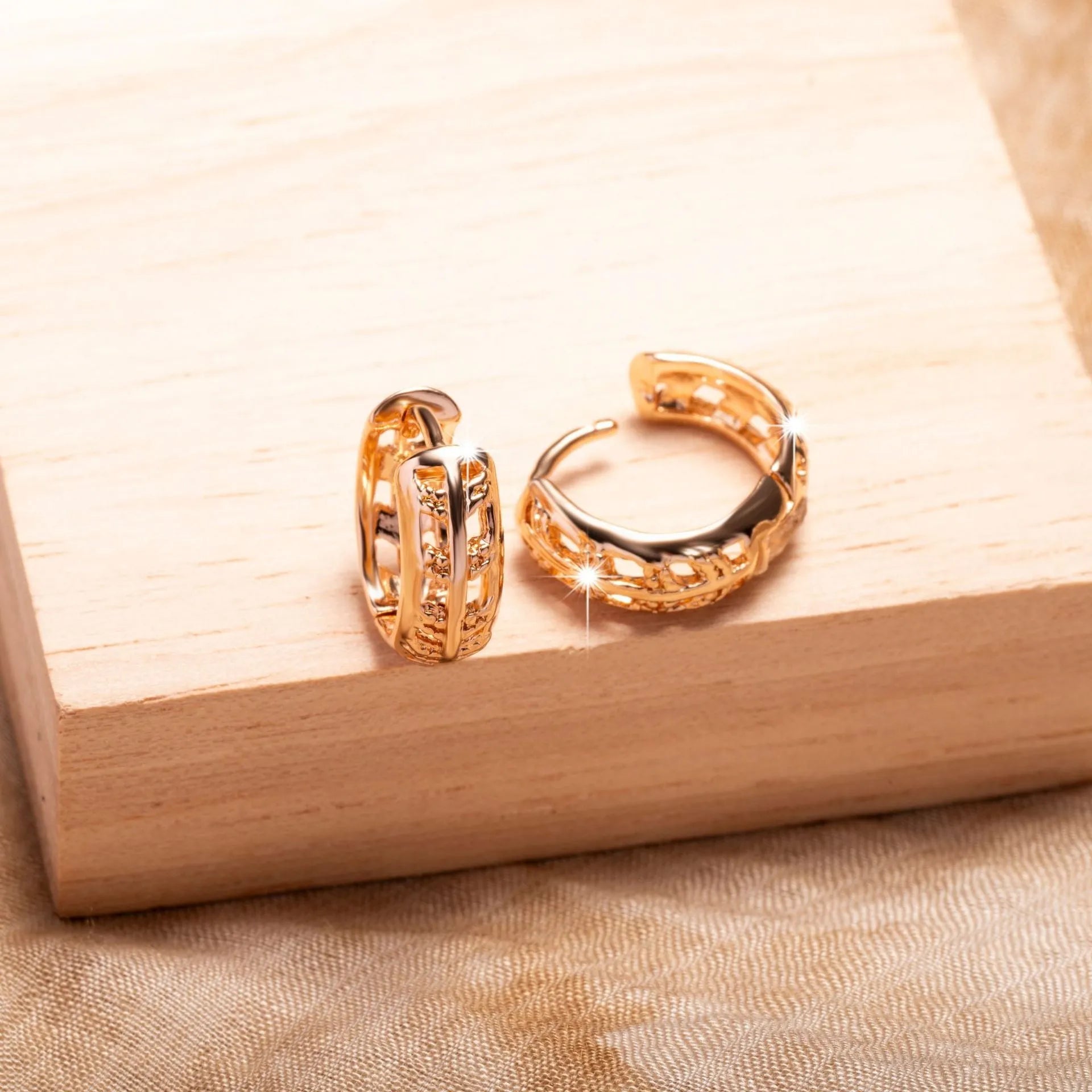Rose gold tone hollowed out copper earrings with combined heart and leaf shapes