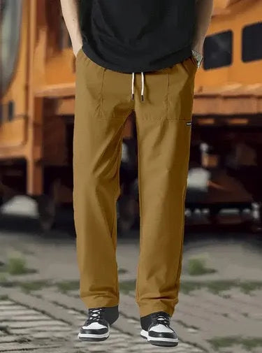 Men's casual polyester trousers for spring and autumn in various colours including light gray and black