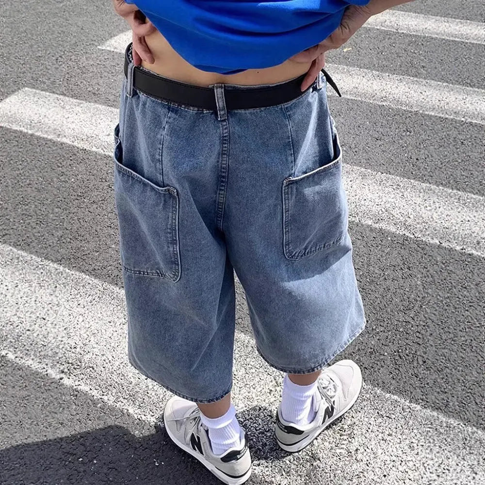 Men's blue washed denim pirate shorts with a high waist and cropped, straight leg.