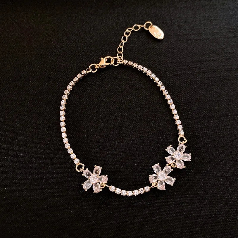 Gold geometric women's bracelet with quadrilateral design and inlaid zircon stones