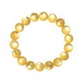 Yellow dragon gold lepidolite mica bead bracelet with geometric round beads on wrist