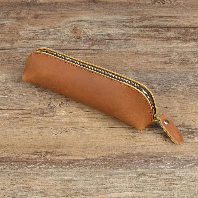 Handmade cowhide leather pencil case in rectangular shape with zipper closure