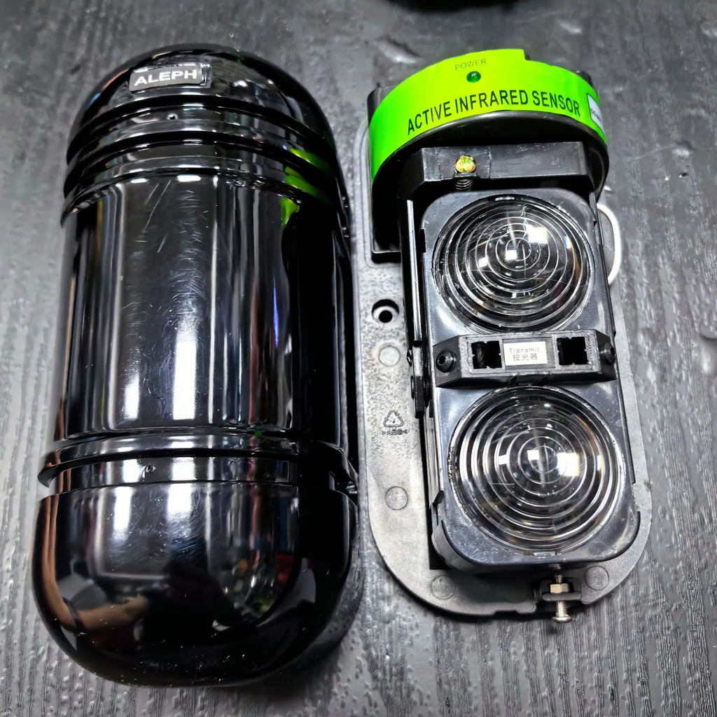Black two-beam infrared security detector with wired connections for 150 metre perimeter protection