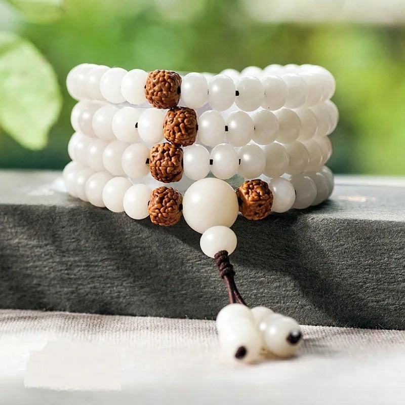 White jade Bodhi bead bracelet with 6x8mm beads in multiple design styles