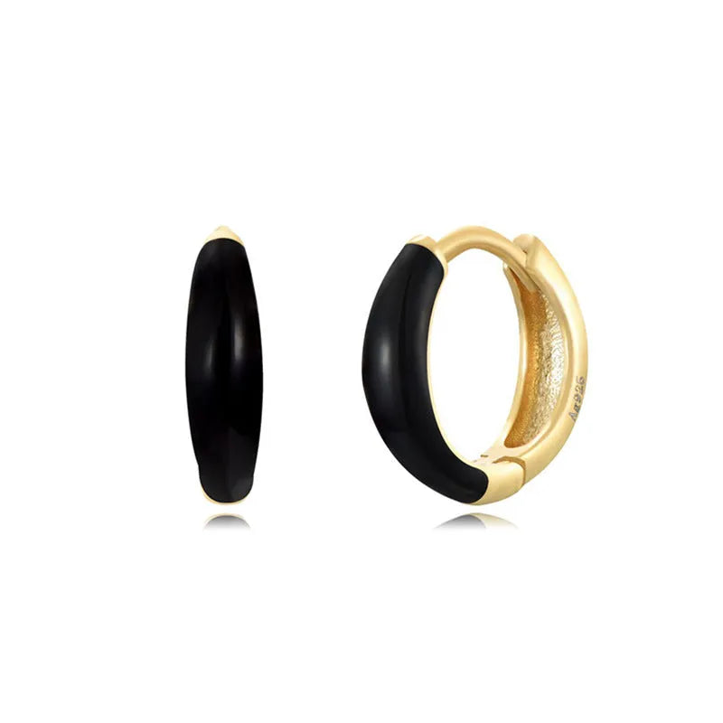 Curved oval epoxy earrings with colourful drip finish in geometric U-shape design