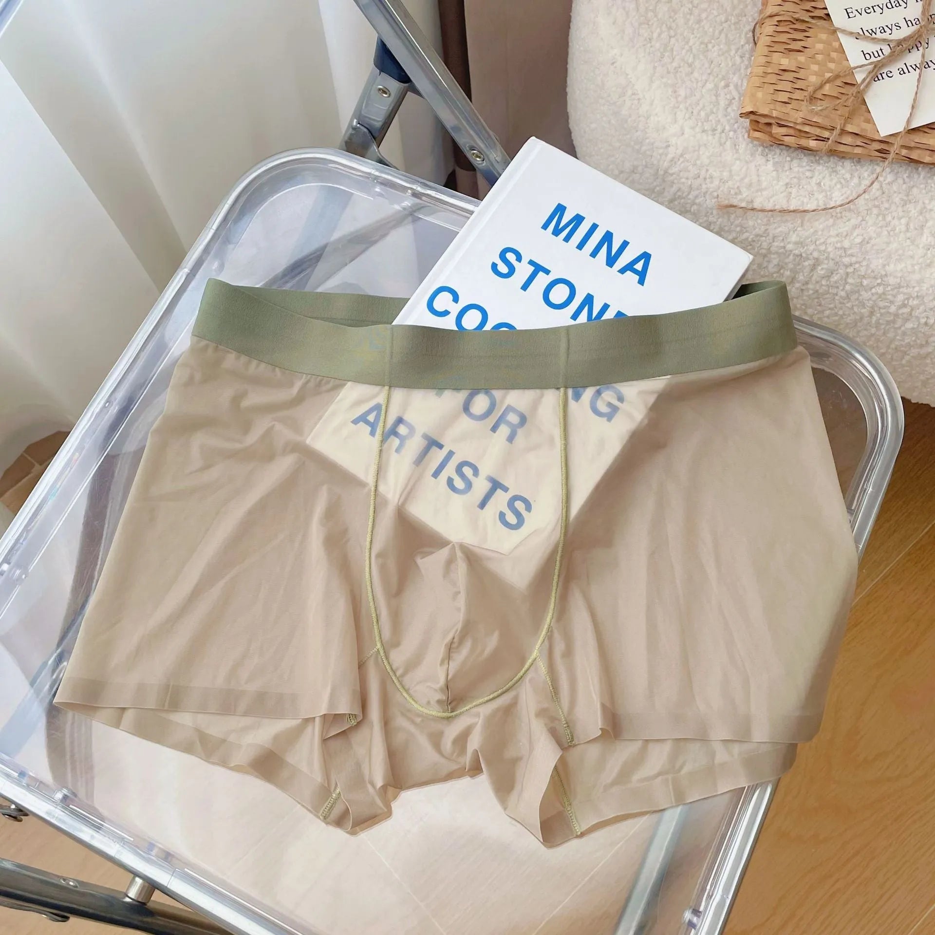 Men's thin seamless boxer shorts in knit nylon fabric, shown in light brown colour with quick-dry and breathable properties.