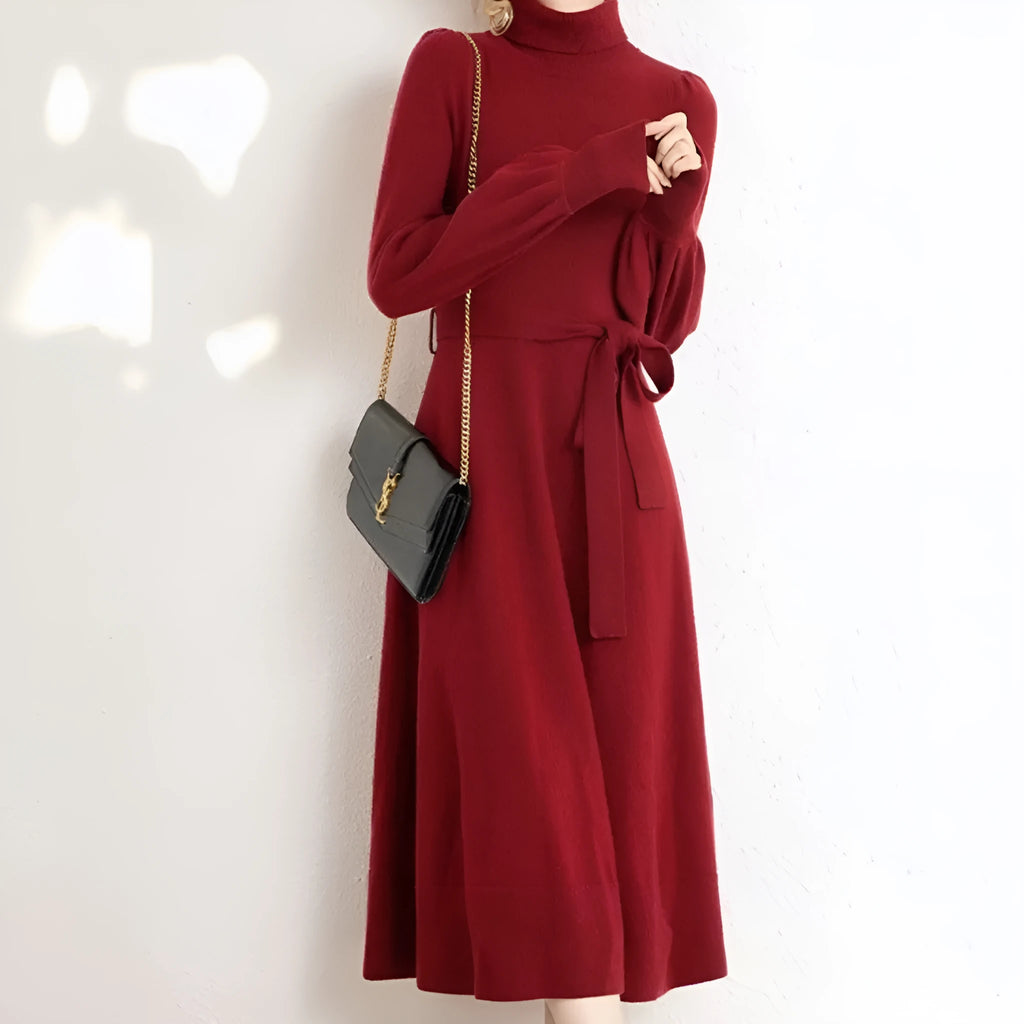 Rose red knit dress with a turtleneck collar, long sleeves, an elastic waist, and a loose big-hemmed midi skirt.