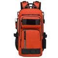 Large orange and black outdoor backpack with 20-35 litre capacity for hiking and camping