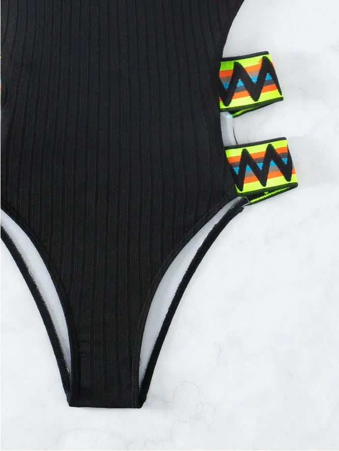 Women's solid colour one-piece swimsuit bikini in polyester fabric available in black or orange