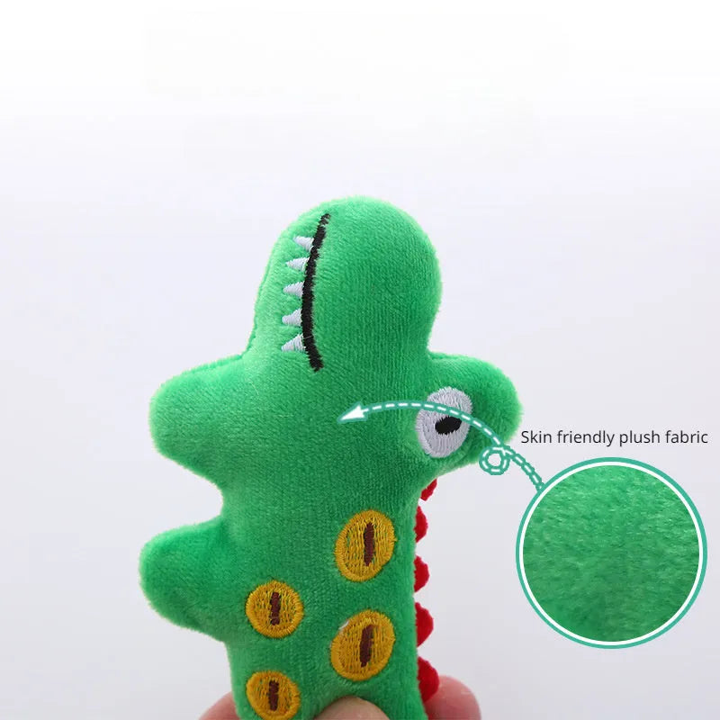Soft plush cat toy shaped like a cow, a parrot, and a crocodile, each containing catnip for pet play.