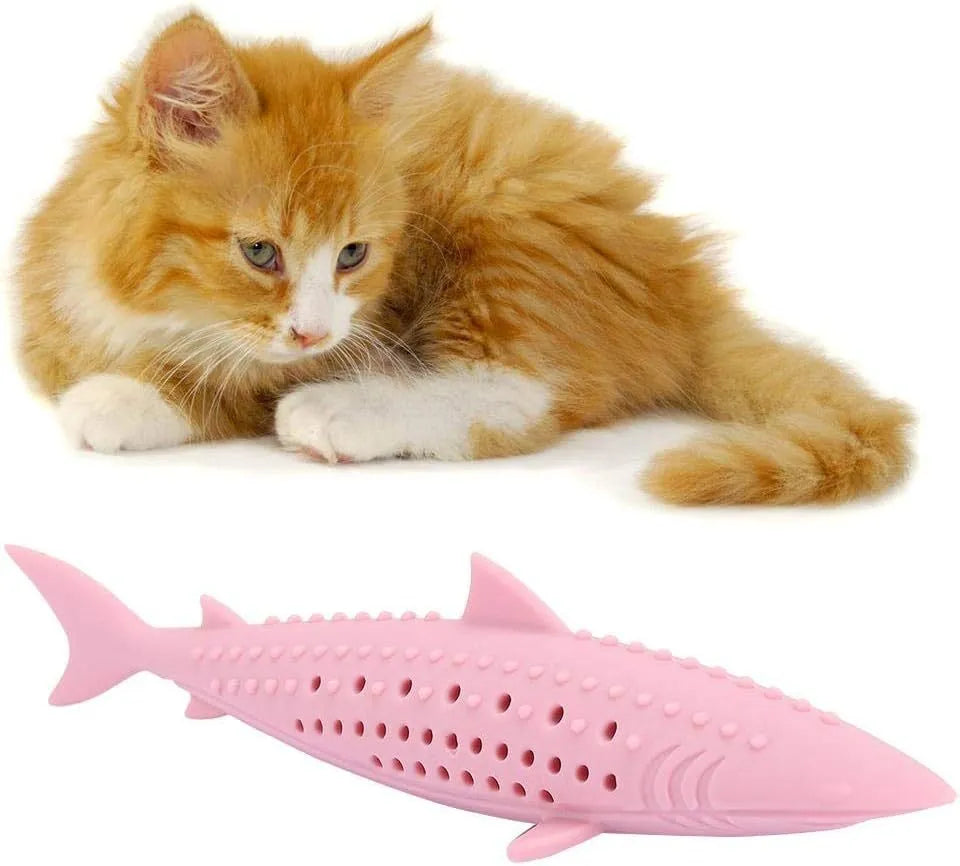 Green silicone fish-shaped chew toy for cats on a white background