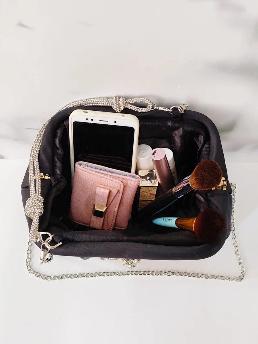 Women's soft polyester crossbody messenger bag in shell shape with chain detail and document compartment