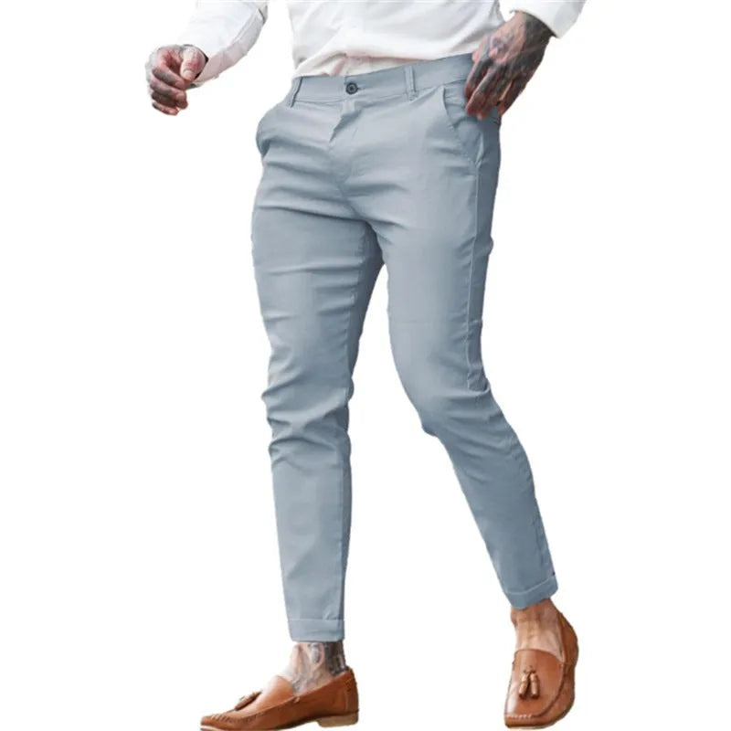 Men's slim fit pencil trousers in cotton twill with high elasticity, showing colour options and pencil silhouette