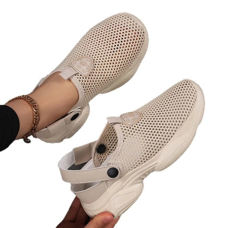 Women's beige Flyknit casual sports sandals with round toe holder, shown on a foot.