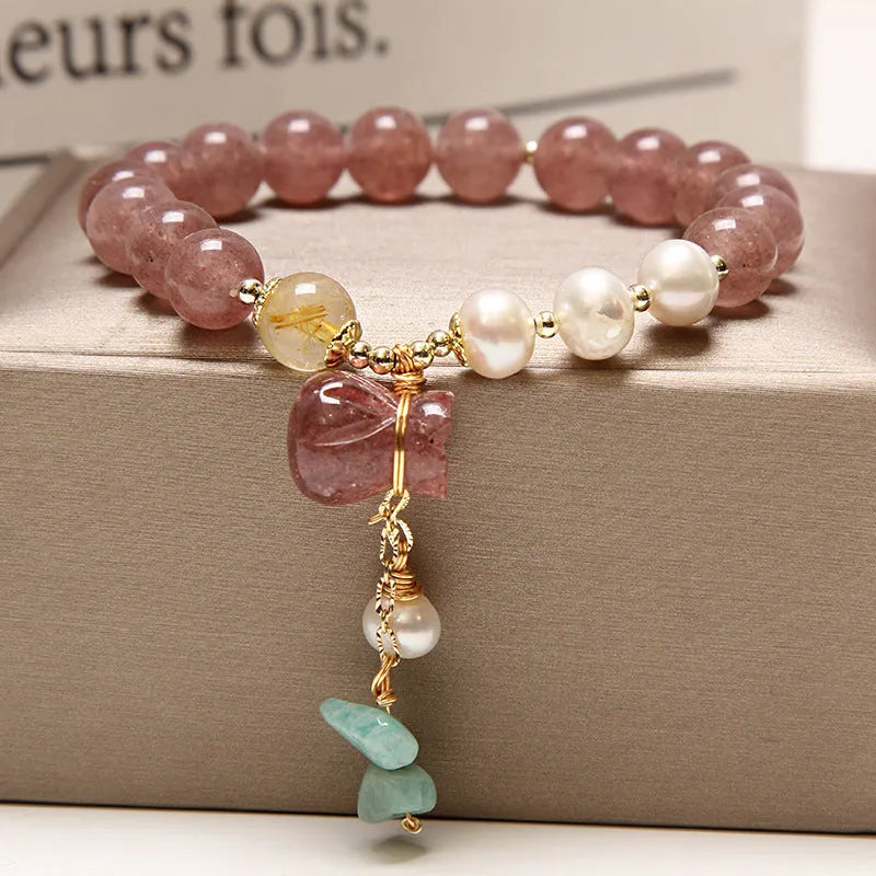 Natural garnet multi-layer crystal bracelet with strawberry quartz, moonstone, and pendant details in Korean light luxury style