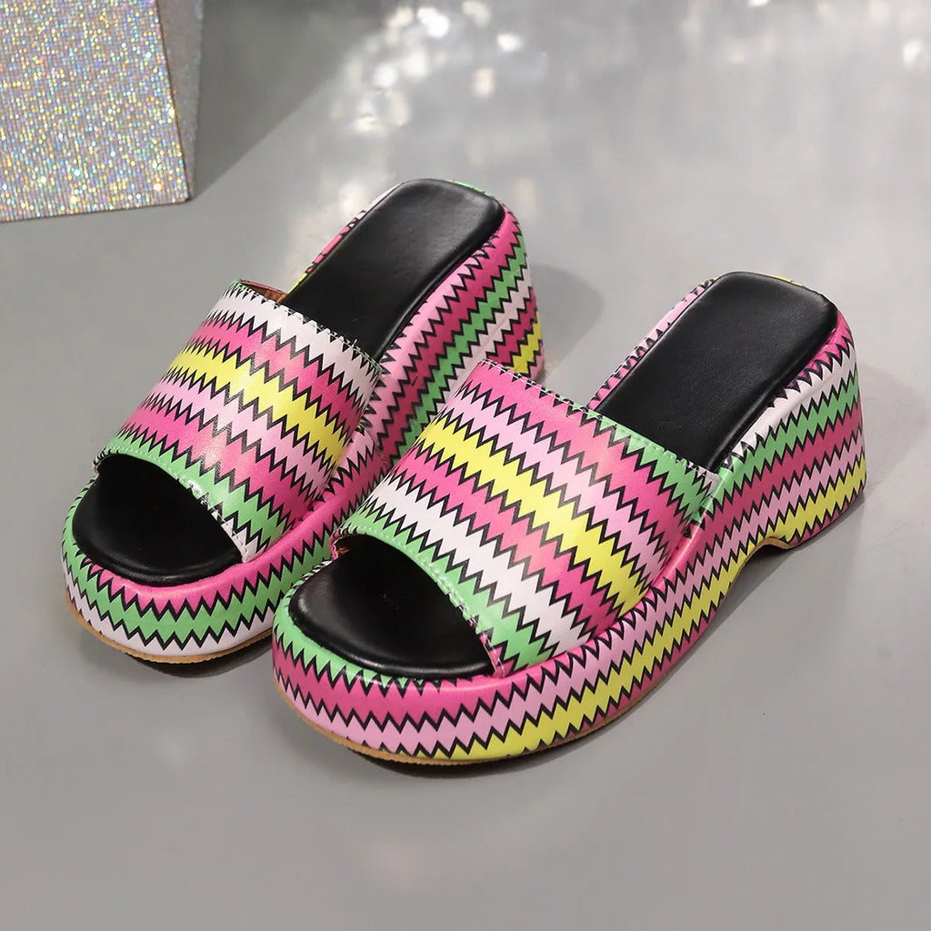 Women's colourful wave print wedge sandals with fish mouth toe and thick rubber sole.