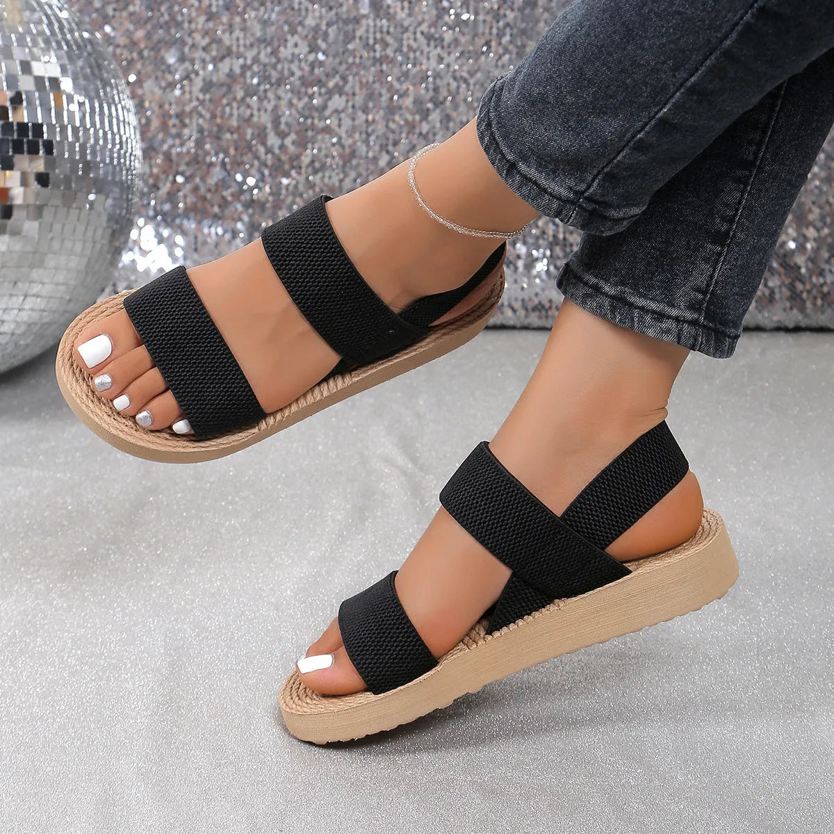 Women's flat wedge beach sandals with elastic band upper and EVA sole in median brown colour
