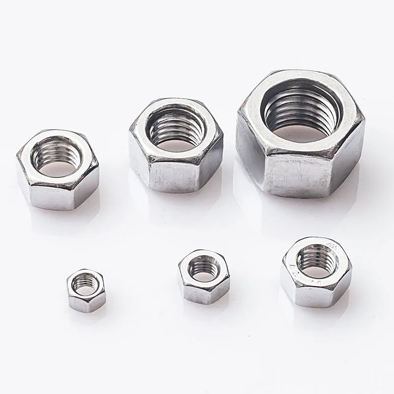 304 stainless steel thickened hex nut assortment from M6 to M56 metric sizes on grey background