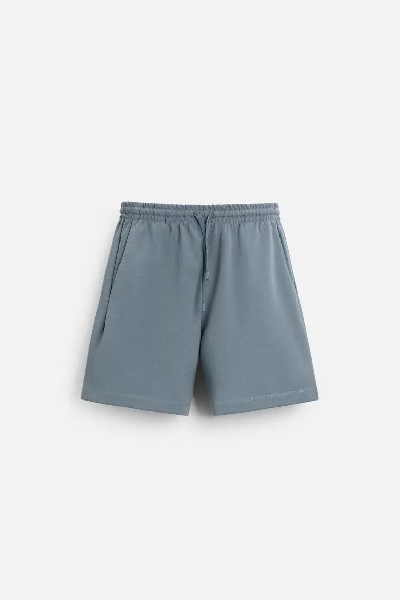 Loose fit short sleeve and shorts set in polyester fabric with double-sided texture