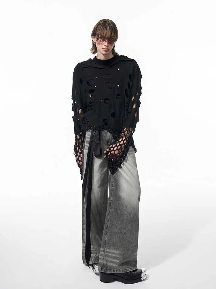 Black men's hooded sweater with pearl decoration on hood showing loose fit and pullover design