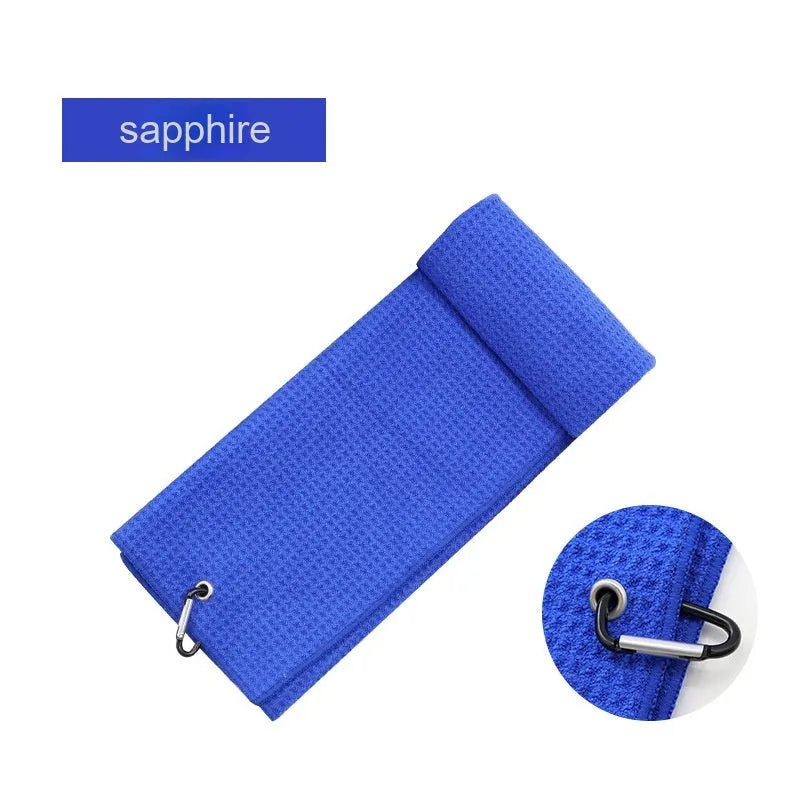 Waffle weave golf ball and club cleaning towel in blue colour showing textured surface