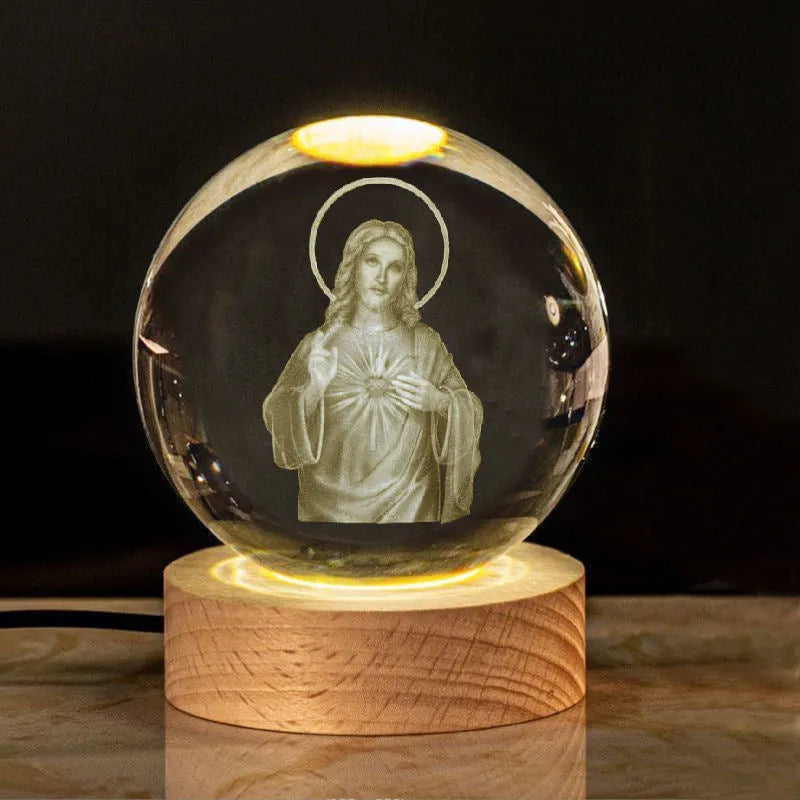 White crystal cross ornament with 6cm ball on wooden warm light base