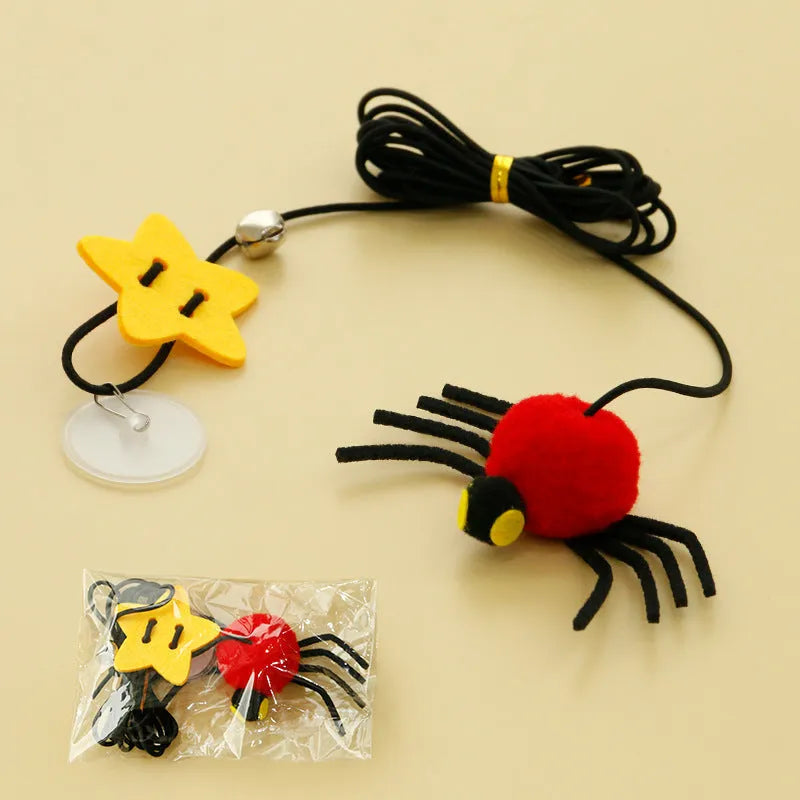 Cat hanging door toy with elastic rope, feather stick, bell, and spider decoration in red or yellow colours