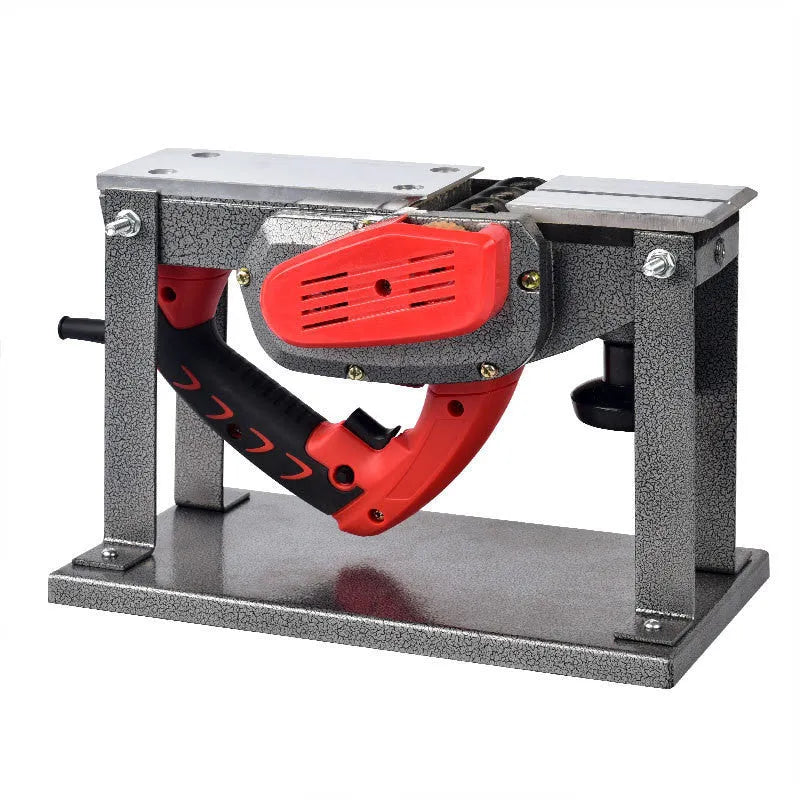 Red desktop electric wood planer with aluminium housing showing 82mm planing width