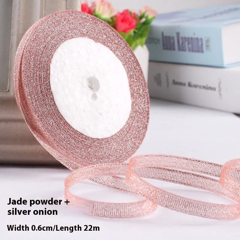 Roll of 0.6cm wide polyester gift ribbon in a choice of colours, with 22 metres per roll.