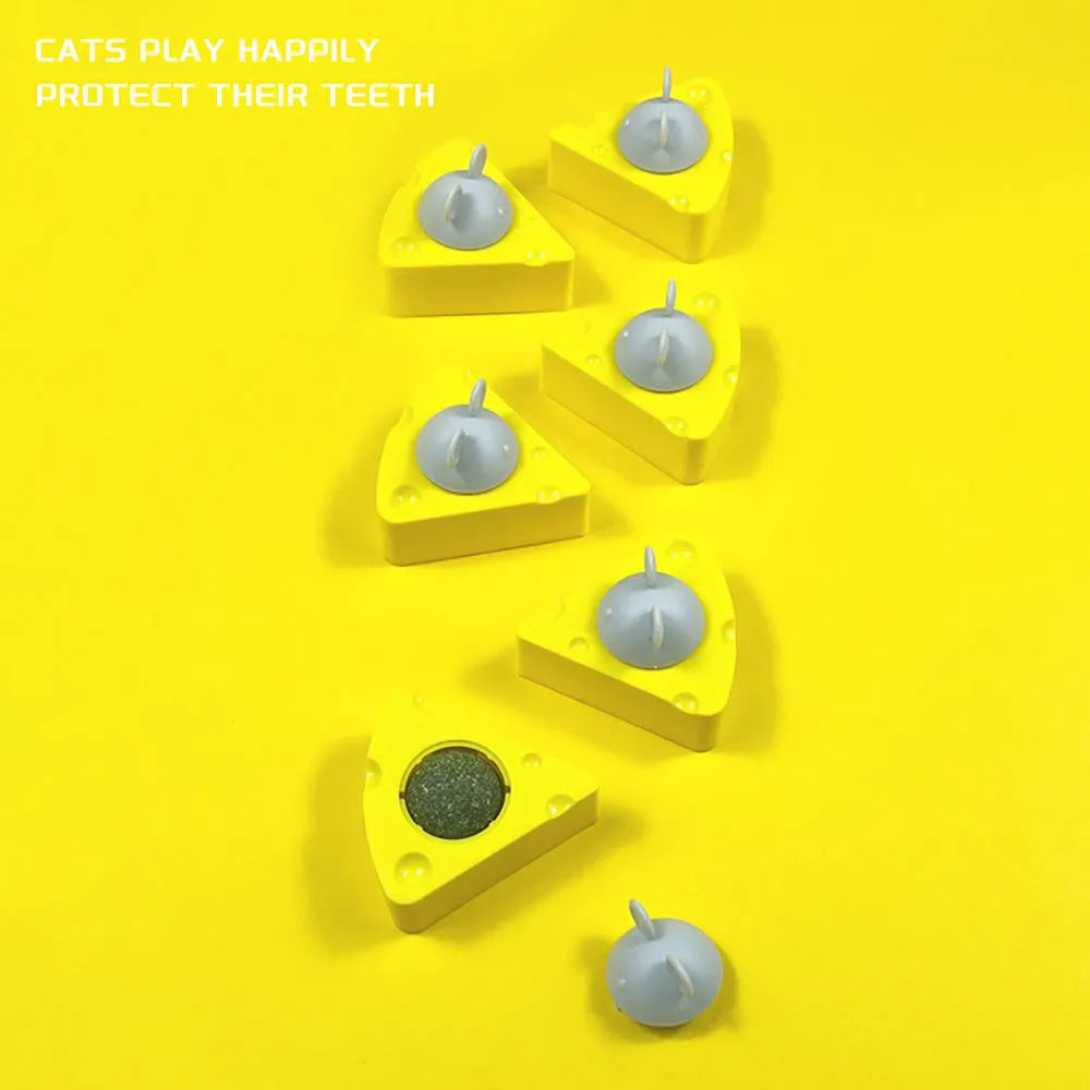 Yellow catnip and silvervine chew toy balls for cat dental care and entertainment