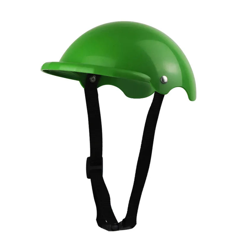 Small S size pink plastic helmet for a dog or cat on a motorcycle.
