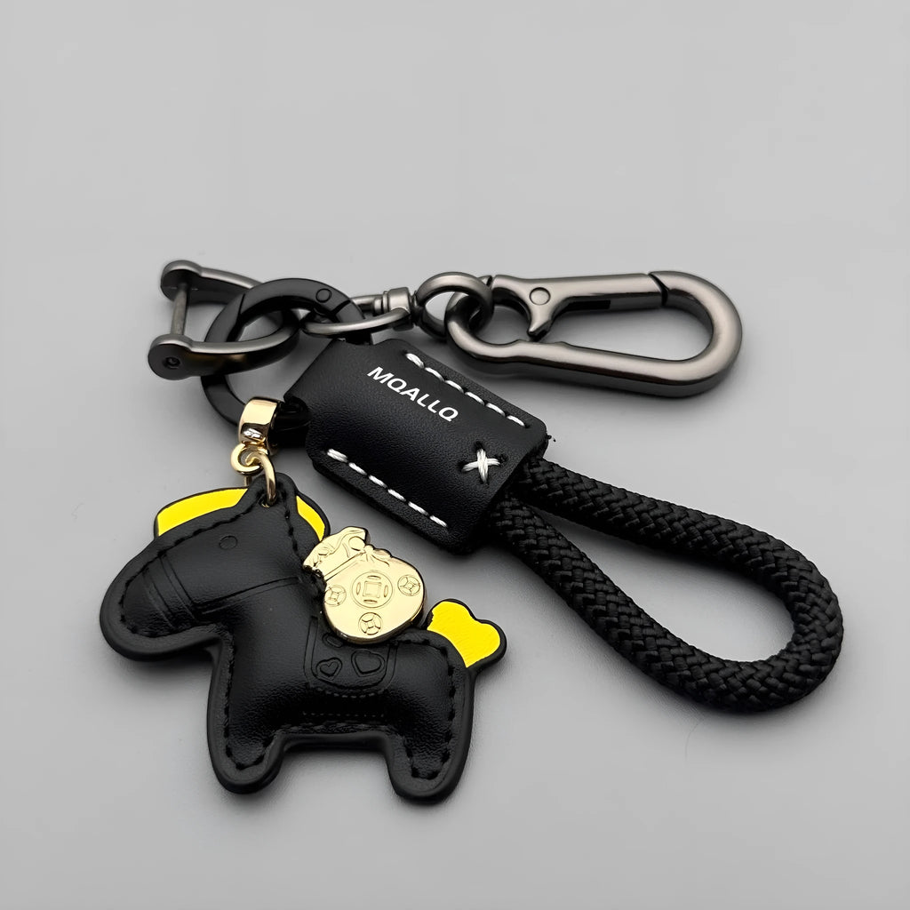 Zinc alloy car keychain pendant with a strap made of brown cowhide and green flannel rope.
