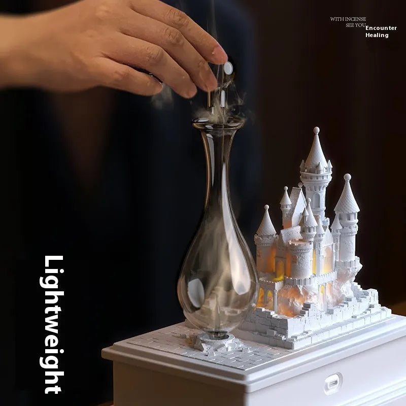 White composite gypsum medieval castle waterless aromatherapy machine with ambient light on a table
