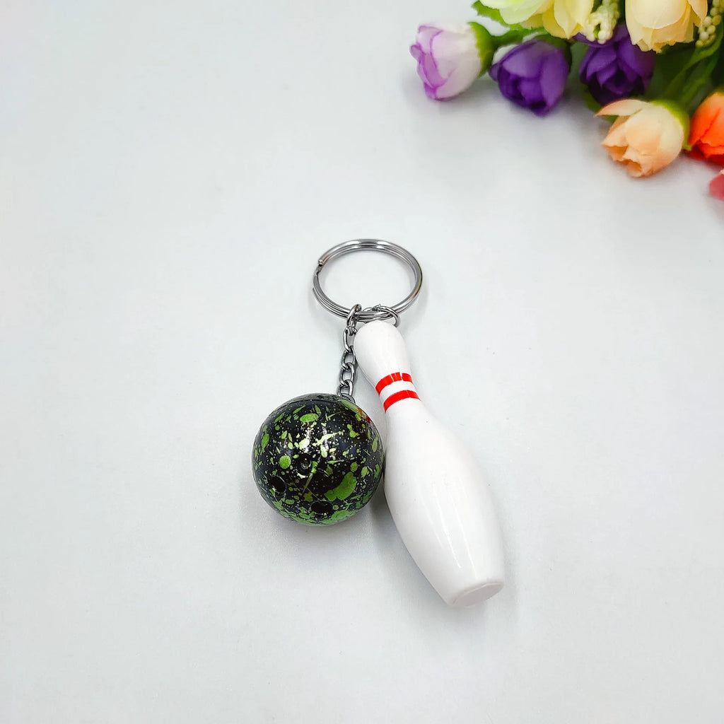 Mini bowling simulation keychain pendant in PVC metal available in four colours