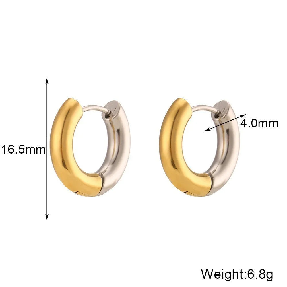 Gold geometric stainless steel earrings, bracelet, and necklace set on a white background.