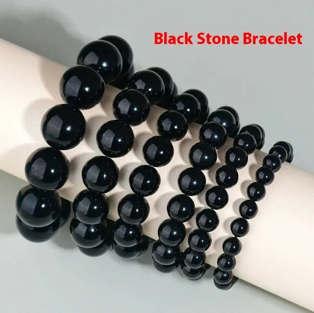 Hand-woven obsidian couple bracelet with year of birth symbols in ethnic style design